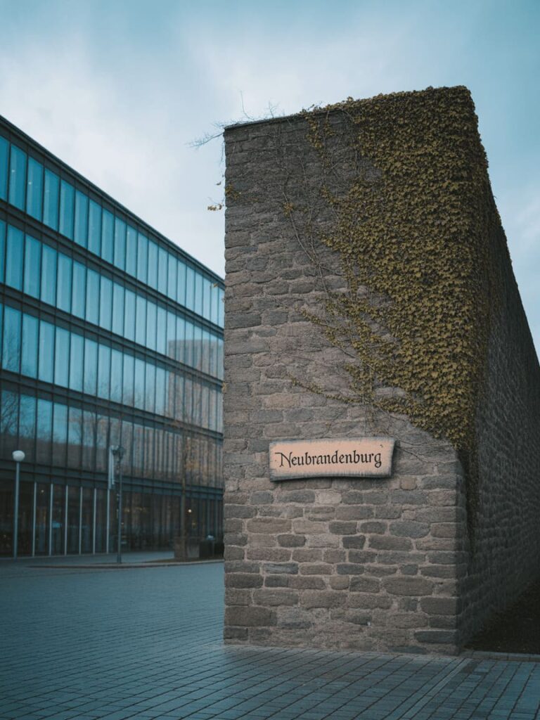 Neubrandenburg city wall with modern building