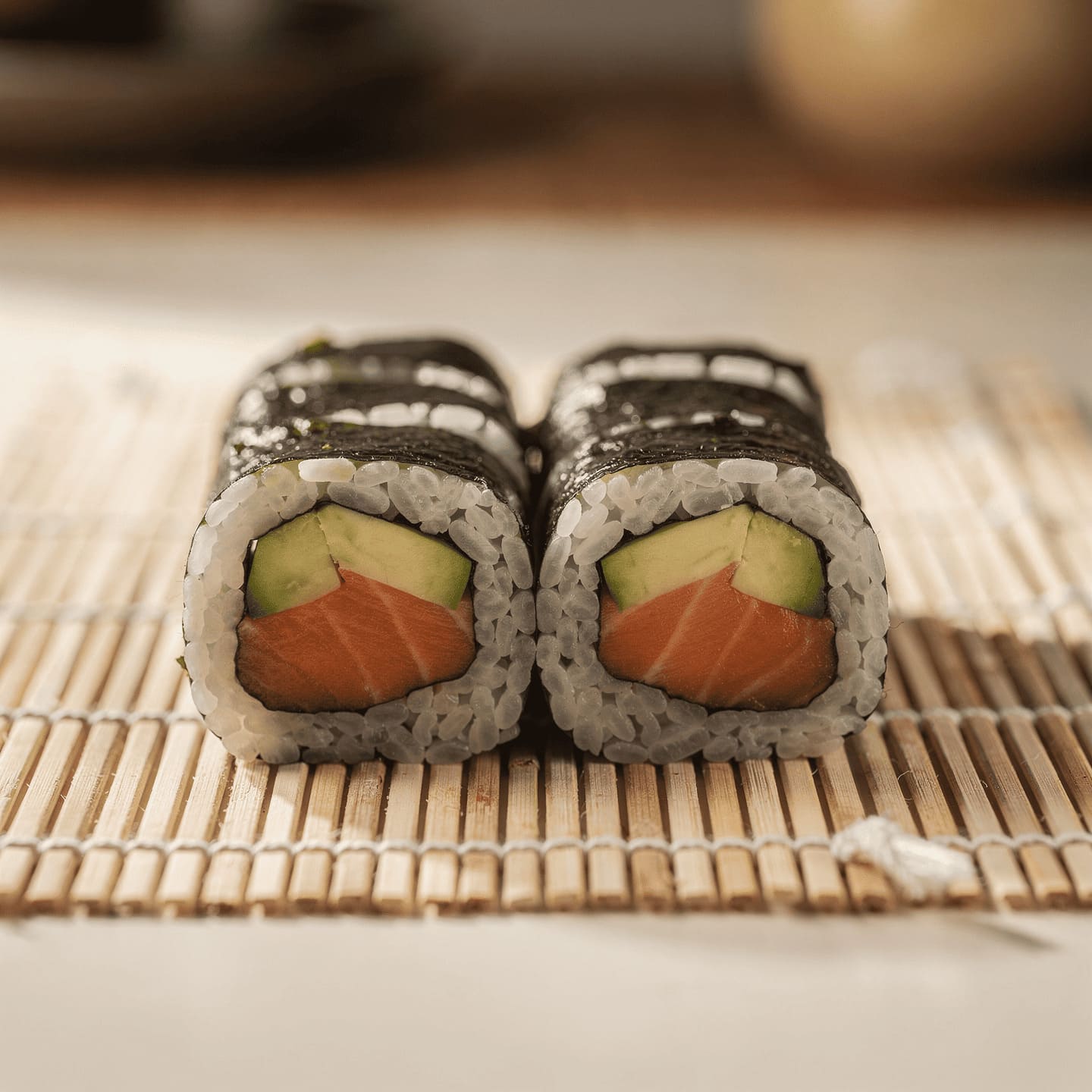 rolling sushi maki with bamboo mat